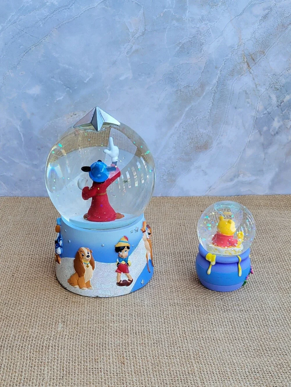 Set of 2 Disney's Snow Globes: Mickey Sorcerer’s Apprentice & Winnie in Honeypot